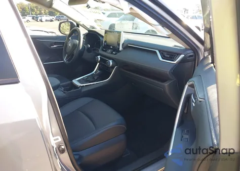 2021 Toyota Rav4 Hybrid Limited from USA, damaged, VIN JTMD6RFV6MD009596